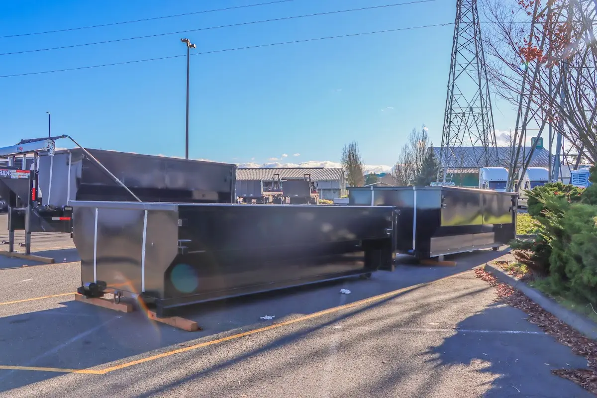 Roll-off dumpster ready for waste disposal at job site for 6 Yard Dumpster Rental in Big Rapids